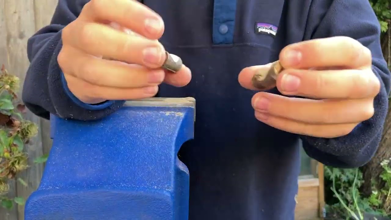 How to make a tripod to hold a phone out of scrap materials **click CC to see instructions**