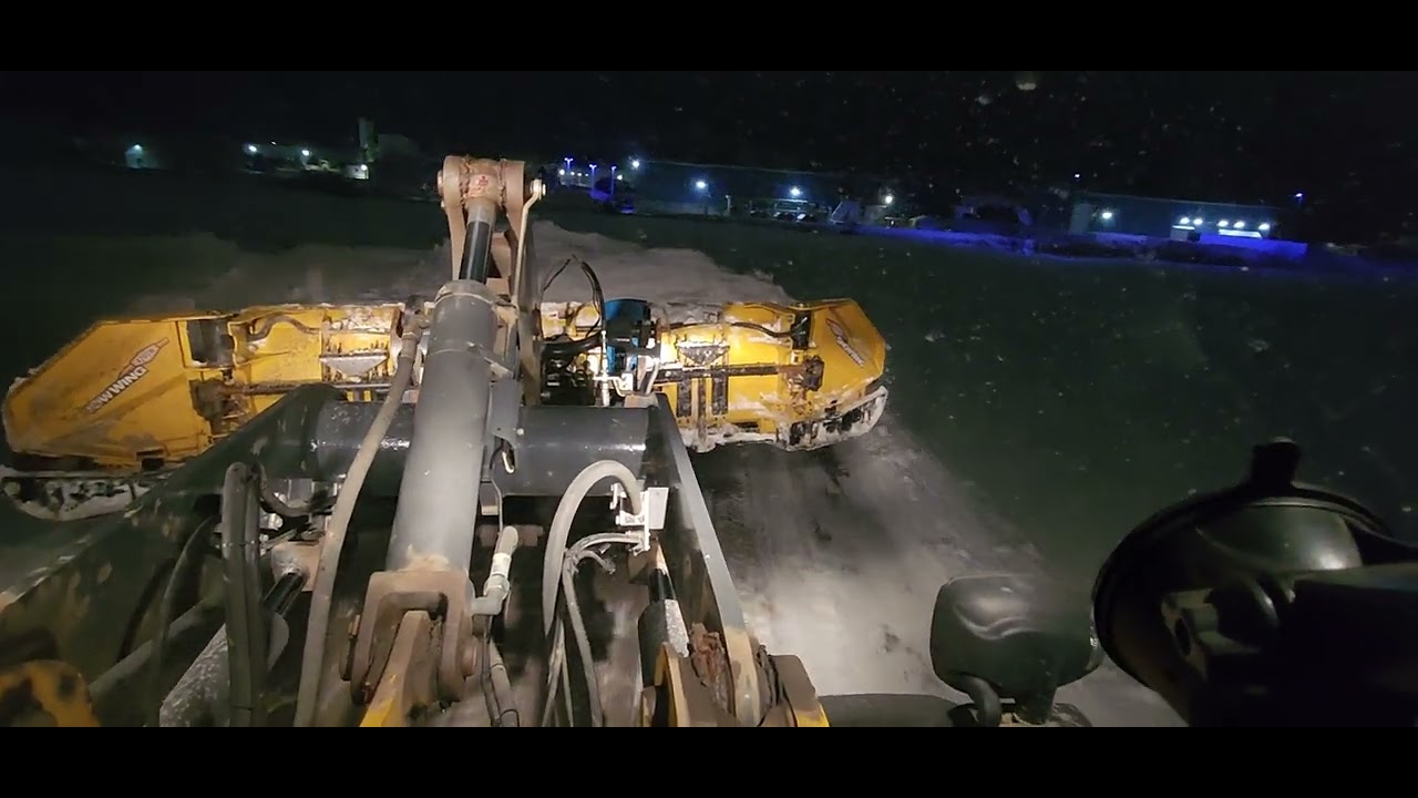 Snow removal. Out in the 344 with the 16 foot blade.
