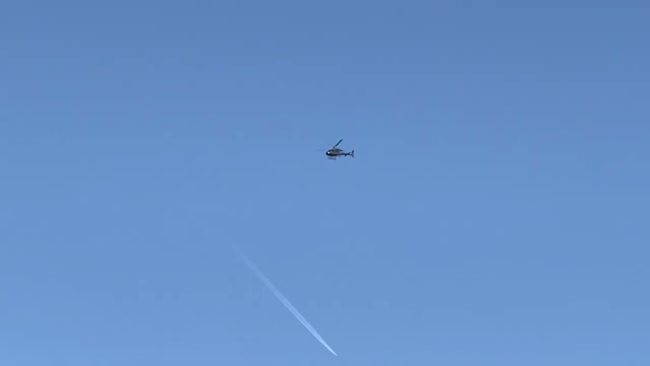 Private Aerospatiale AS350 [G-GMCM] flying above