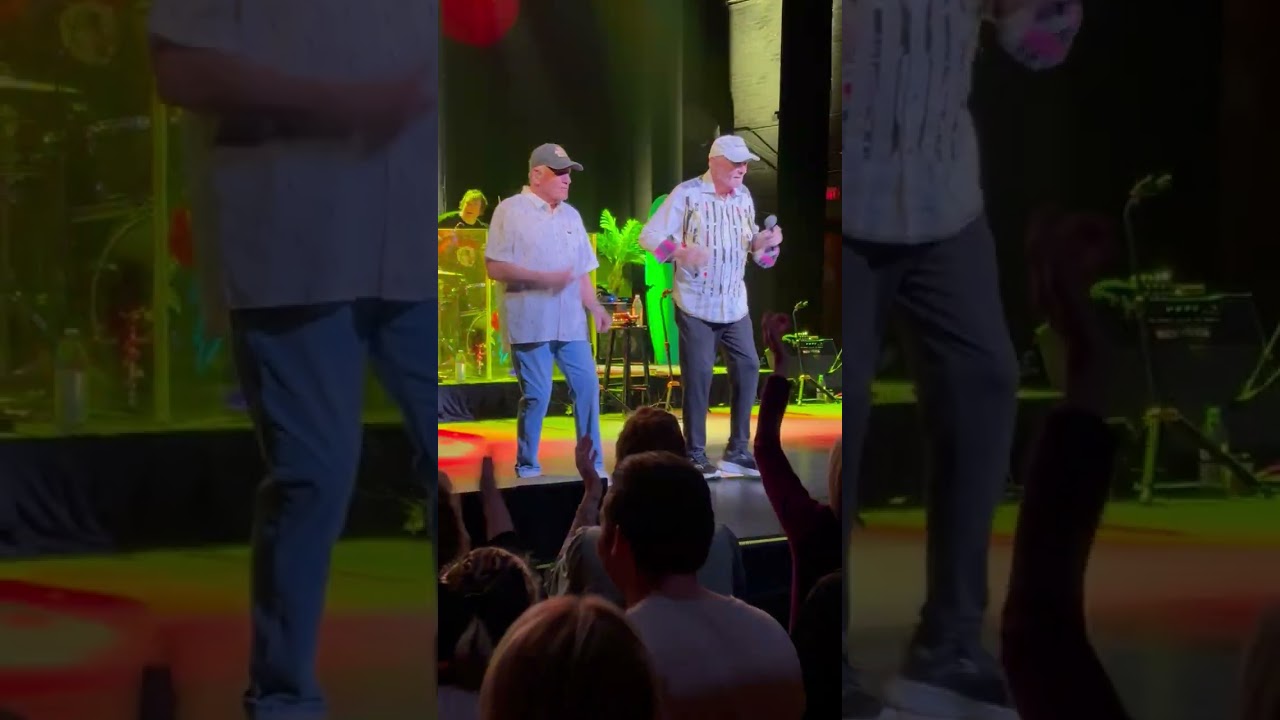 Mike Love and Bruce Johnston dance to 