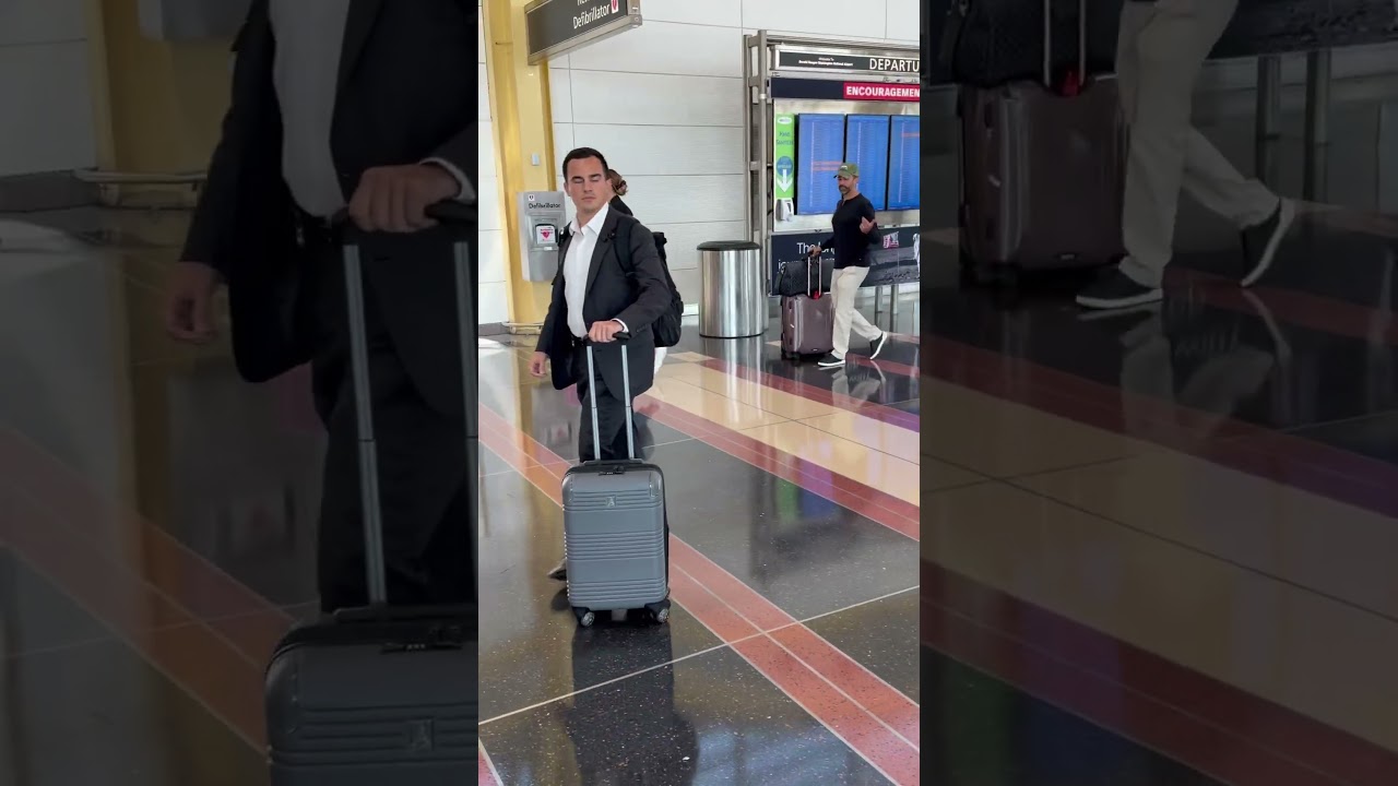 Donald Trump Jr signs for a fan DC airport