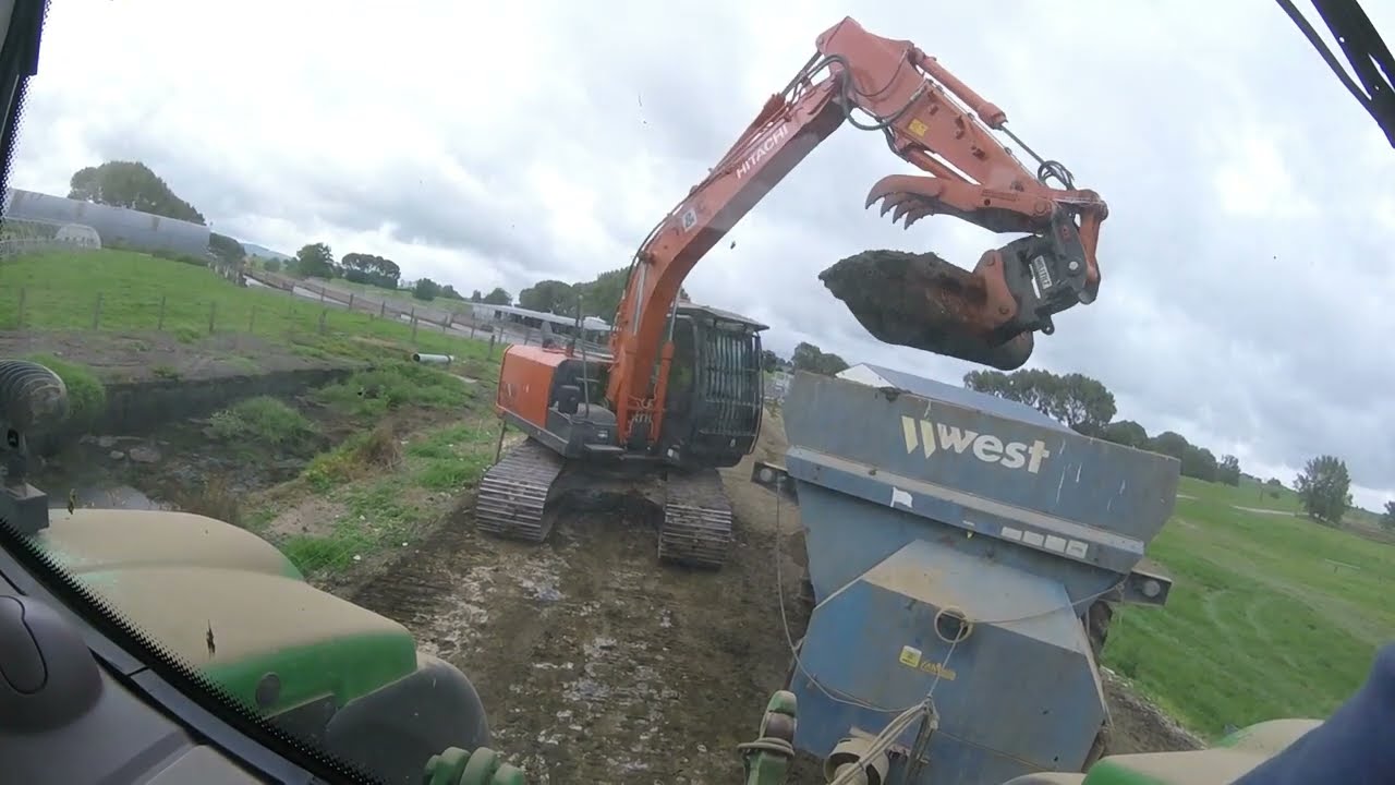 Muck spreading 6155R & West 2000