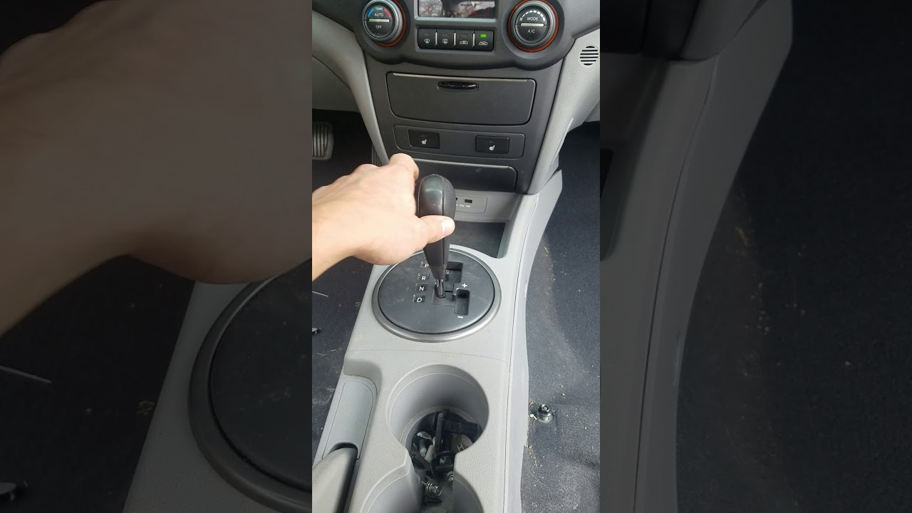How to remove center console on 2006-2008 Kia Optima