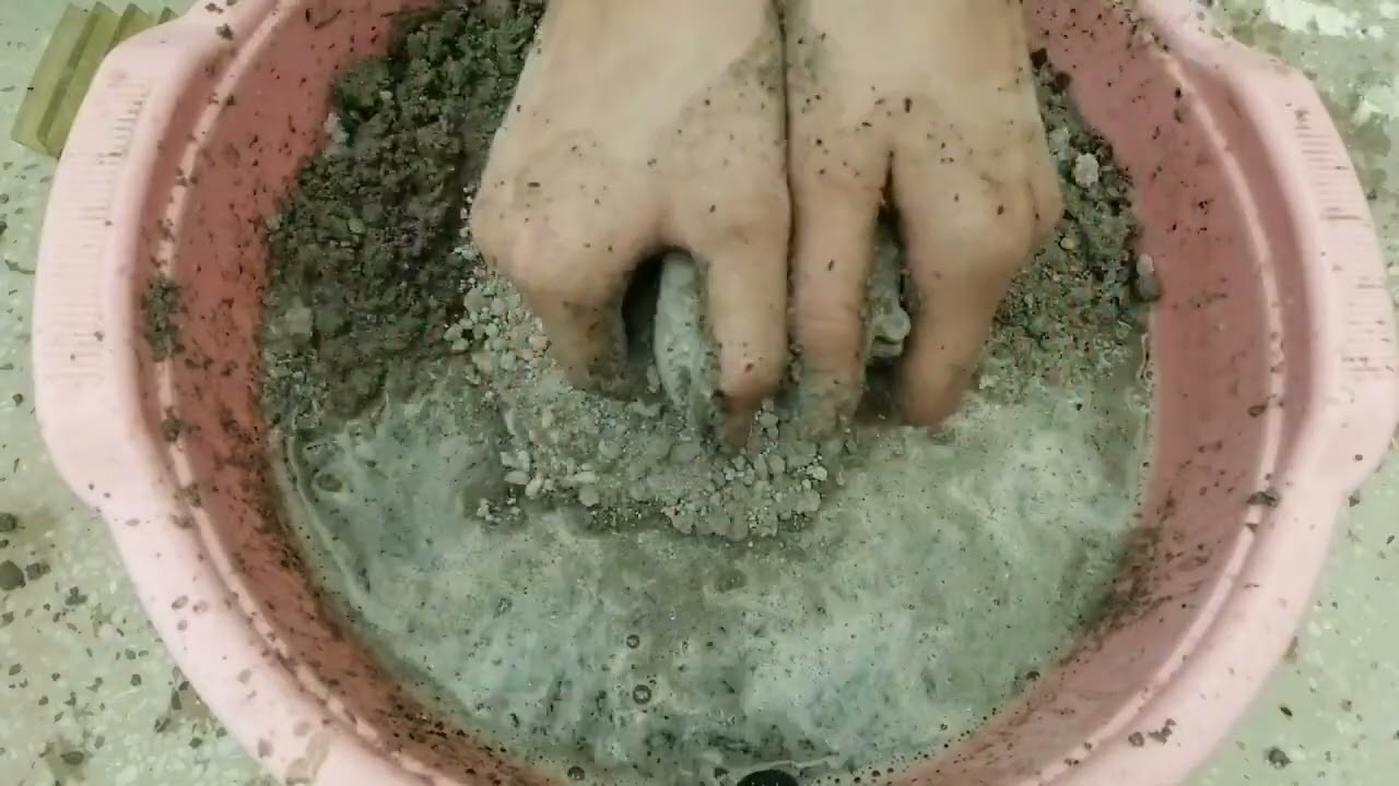 Gritty Cement Shapes Dipping in Water 