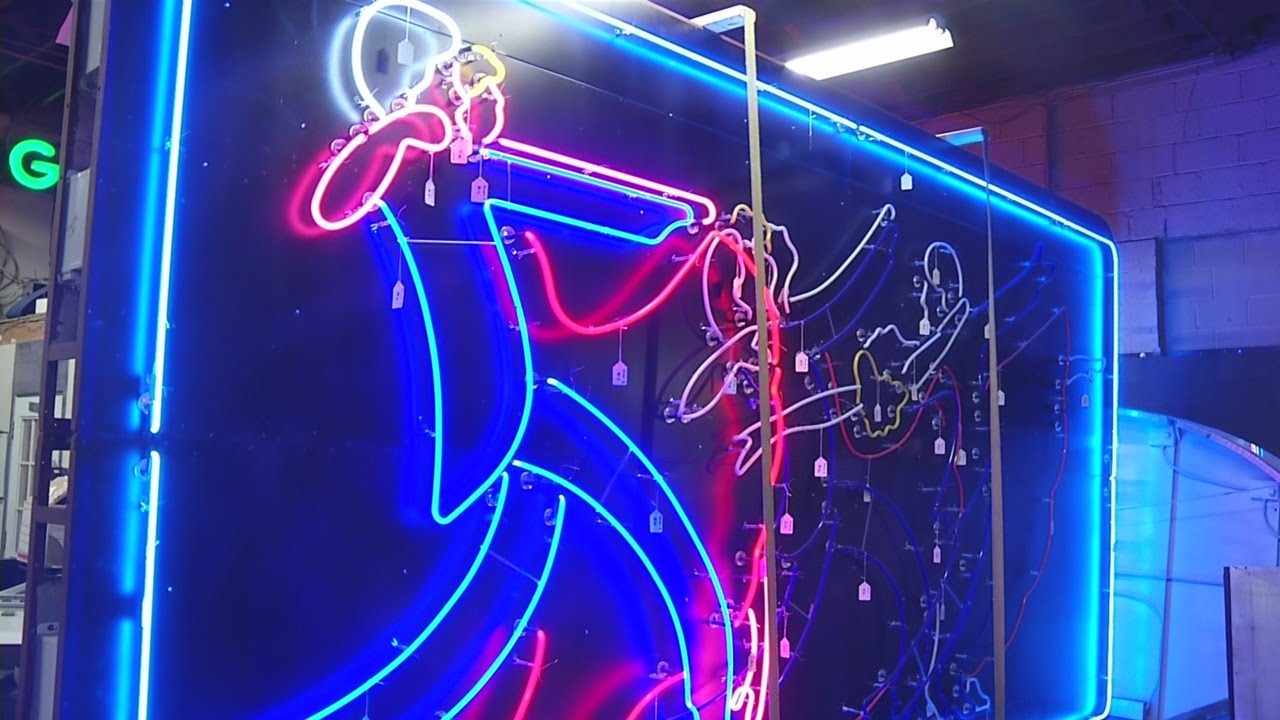 Classic neon tango dancers sign restored and ready to make return