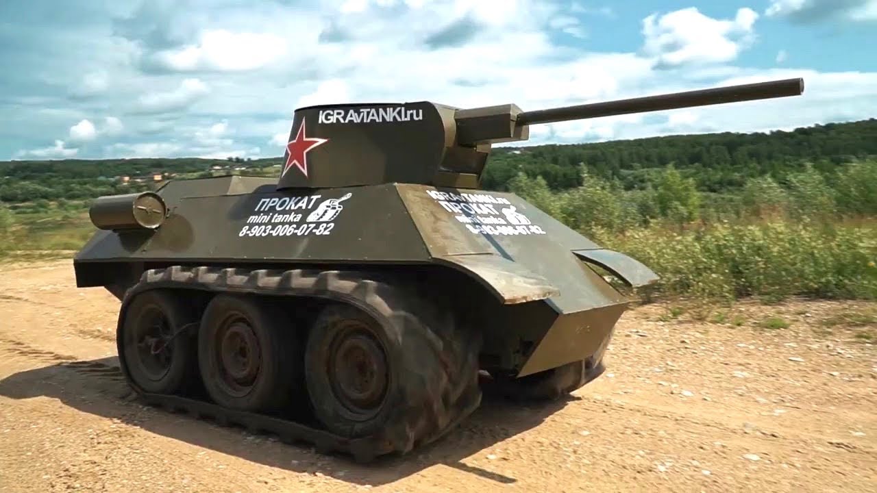 We made a tank! Car engine, electric turret and cannon, real skid steering etc.