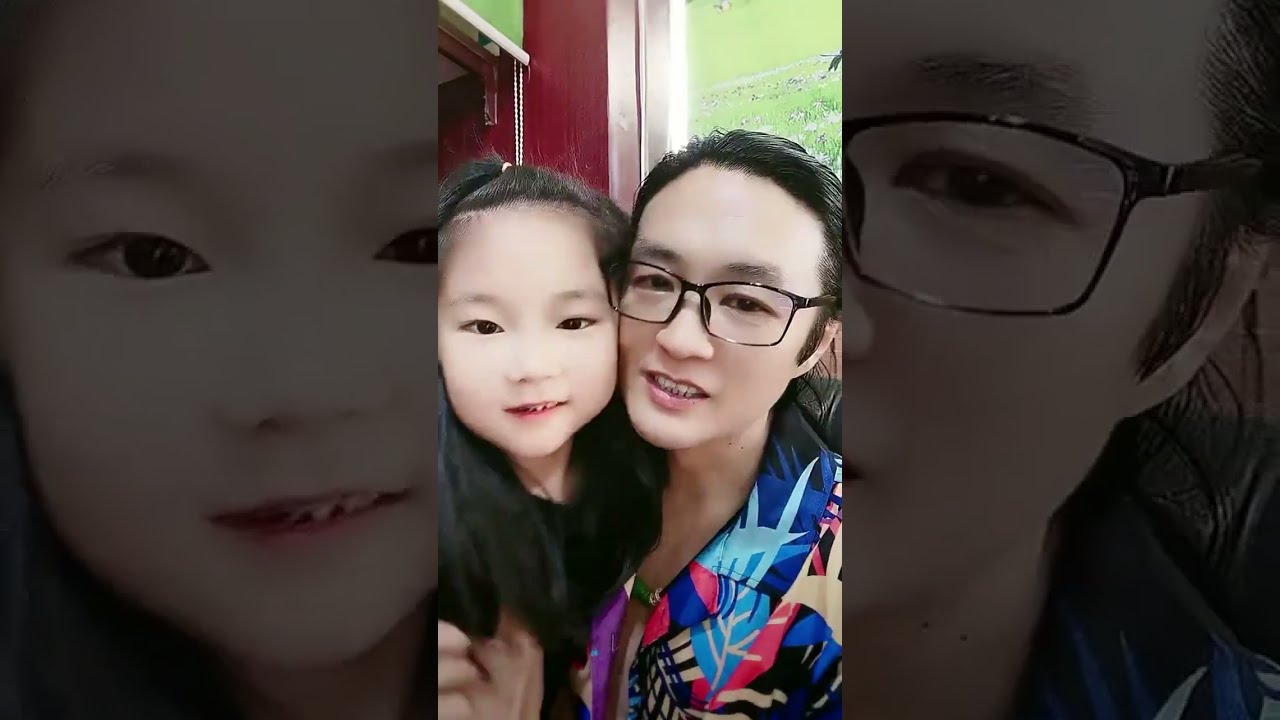 Jian looks so happy playing with his granddaughter