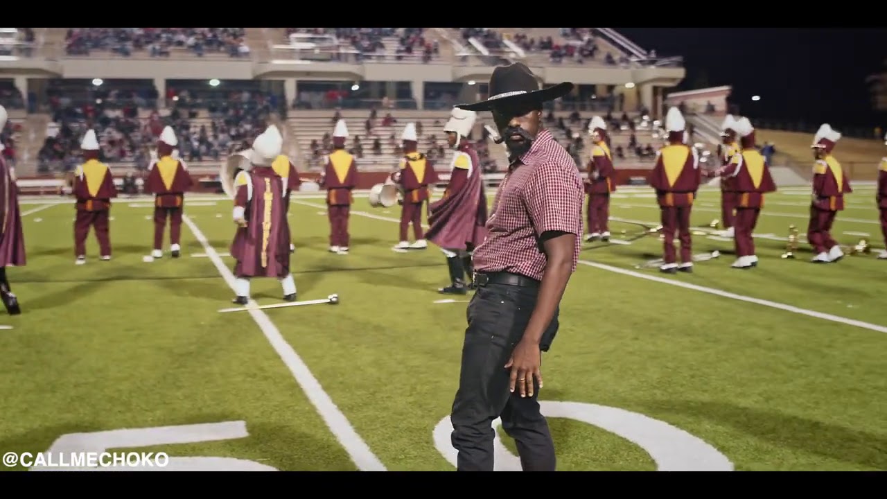 Tio Choko Dances With Marching Band