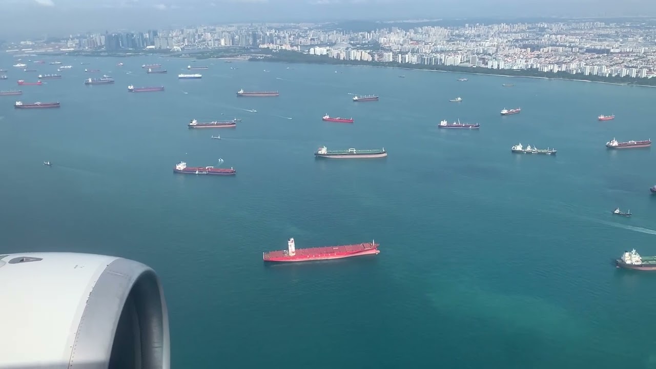 Singapore-Our A320 flight landing sea scenic approach to Changi airport