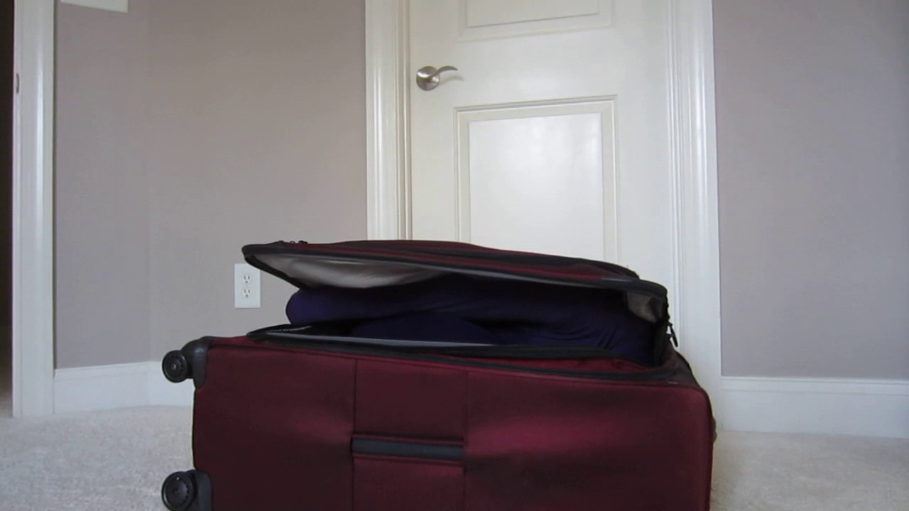morphsuit suitcase contortion