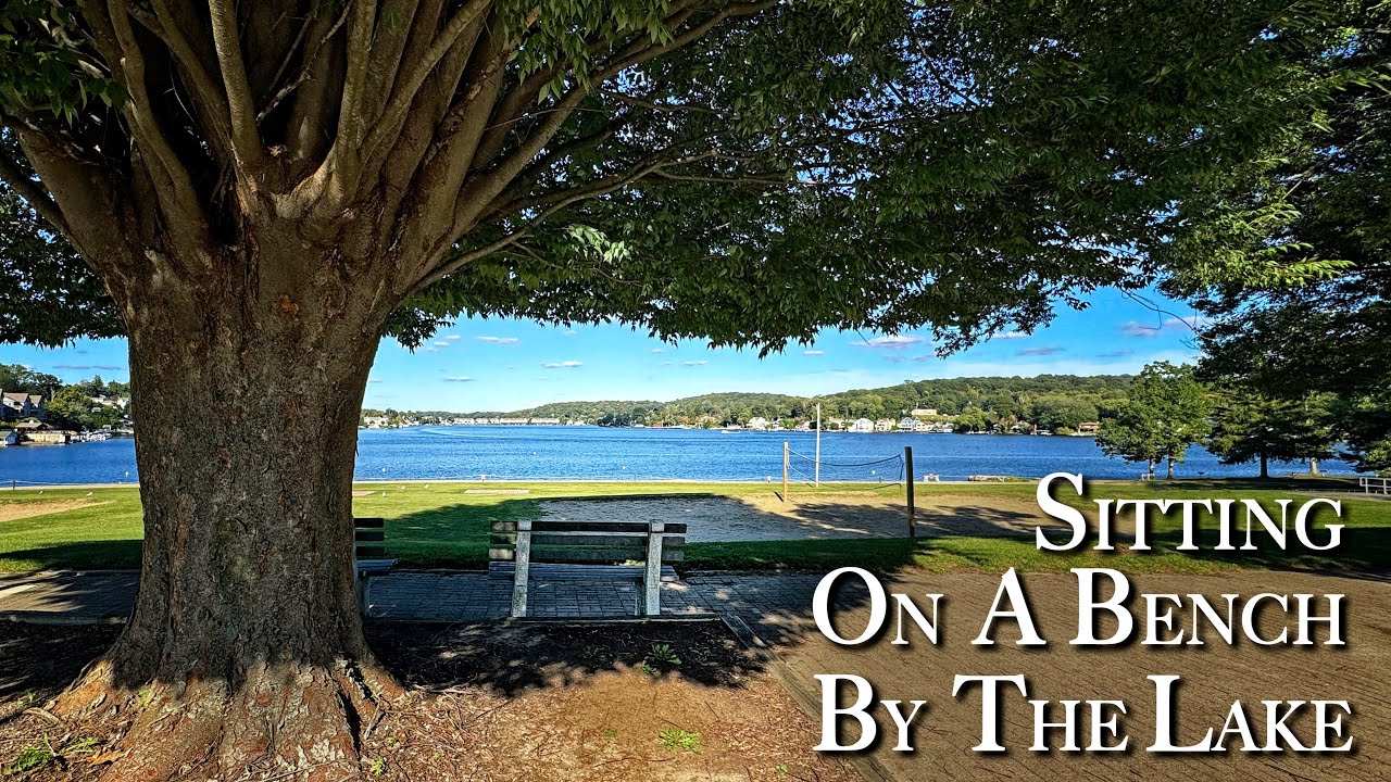 Sitting On A Bench By The Lake