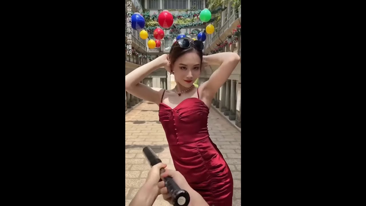 TikTok (Trend/Meme Origin) | Chinese Woman in Red Dress Dodging Bat