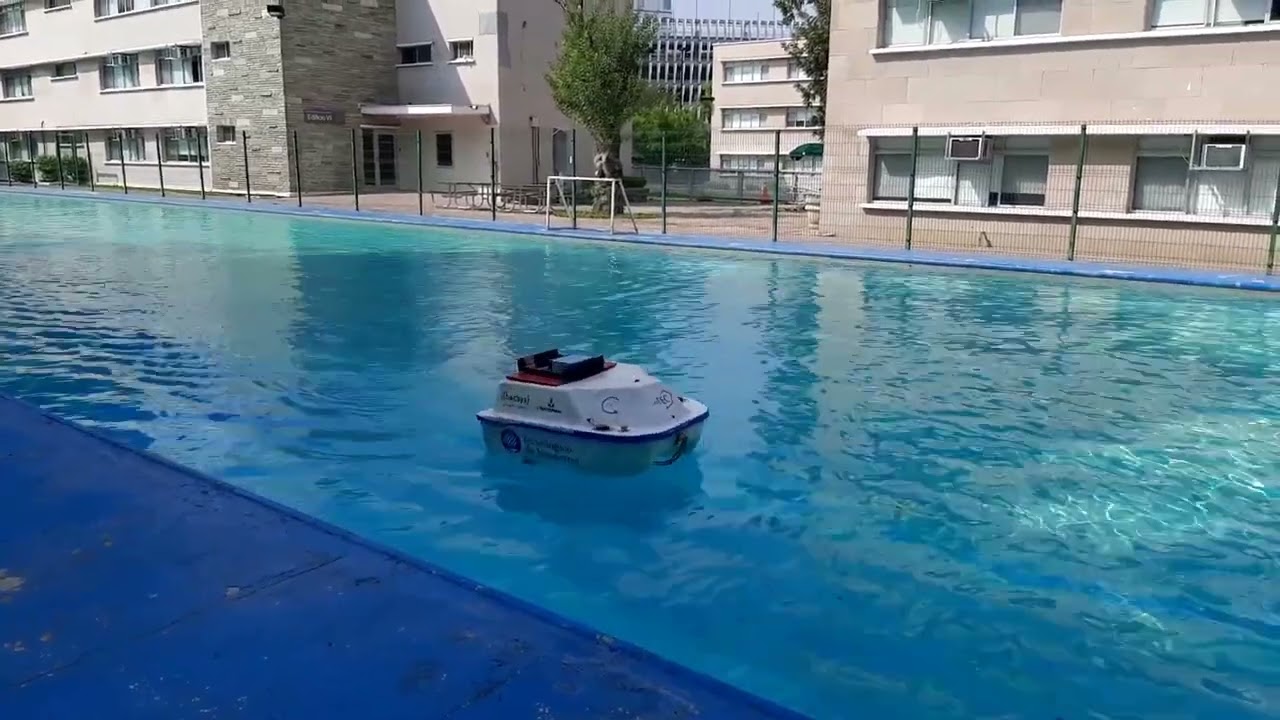 Finite-time control for an Unmanned Surface Vehicle based on adaptive sliding mode strategy