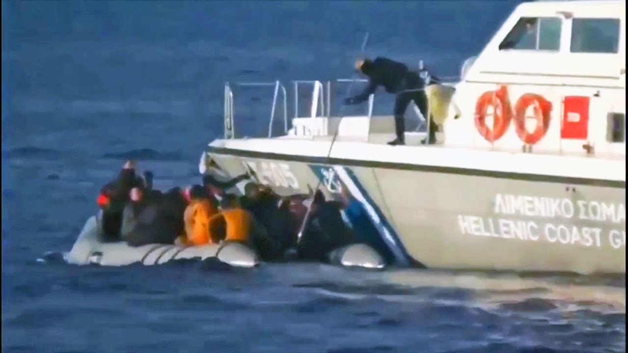 Greek coast guard 'fires shots' at refugee boat in video released by Turkish government
