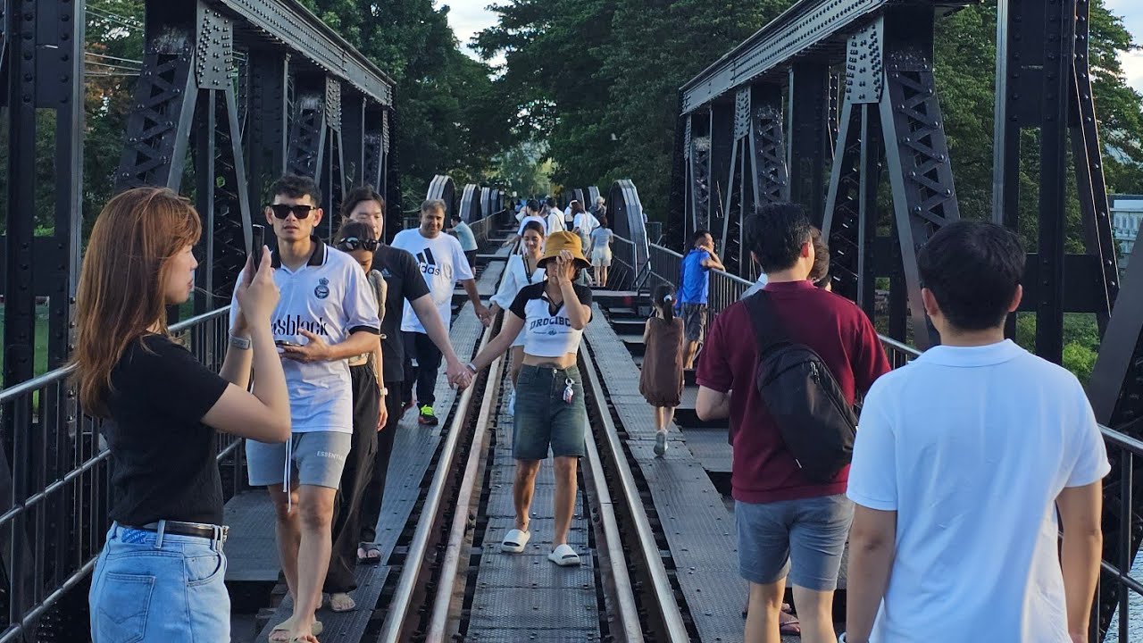 Train Comes Through WW2 Bridge Over The River Kwai In Kanchanaburi, Thailand 🚞🇹🇭