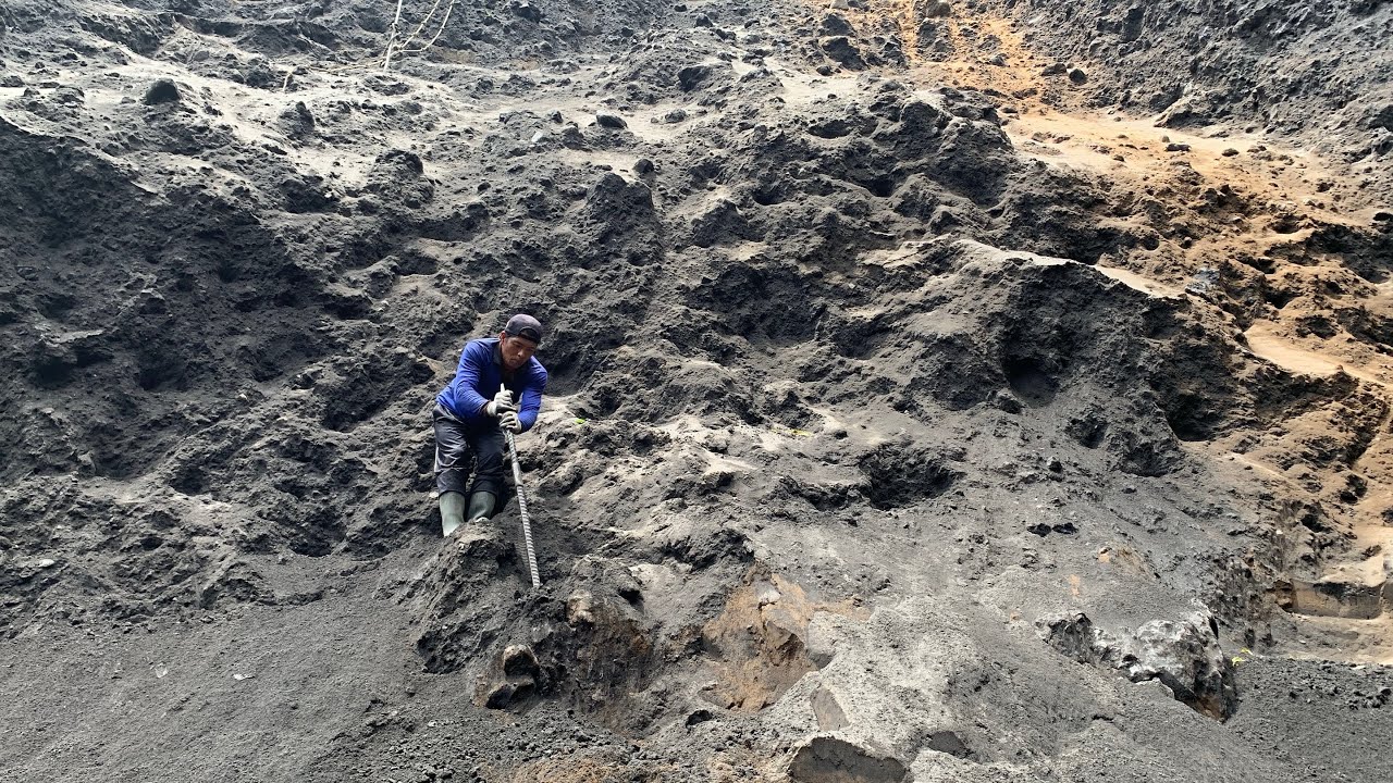 The black sand cliffs are almost level with the ground