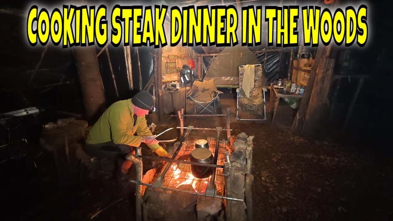 woodland camp cooking a steak dinner