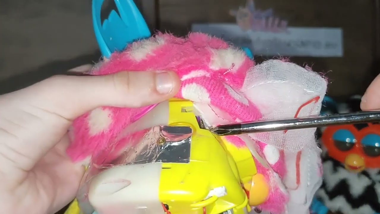 How to fix a Furby Boom that can't move (Part 1: How to skin a Furby Boom)