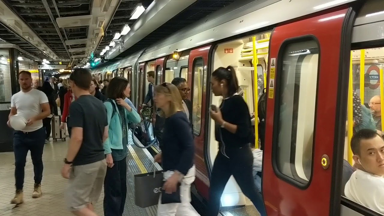 Victoria Station, Circle & District Lines. London Underground tube trains, eastbound platform