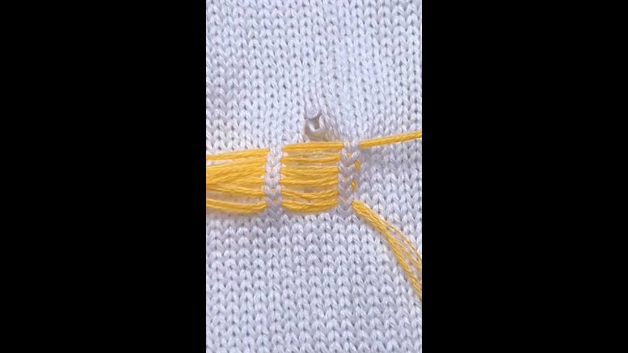 Lesson on darning holes in a sweater
