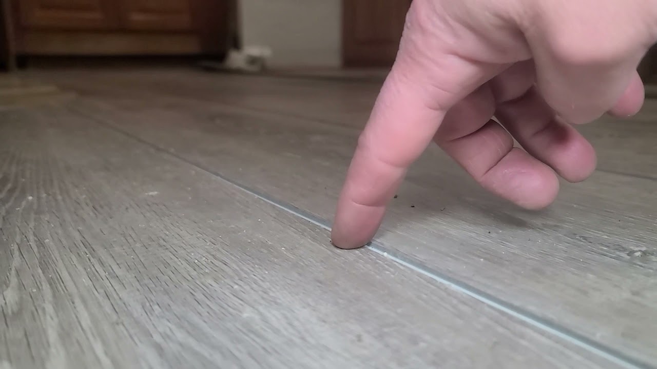 Improper flooring installation in a RV.  This is why we don't use this type of flooring!