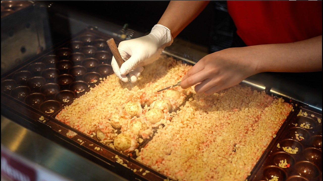 «OSAKA Takoyaki Market» — популярное место в Осаке, где собираются знаменитые магазины такояки.