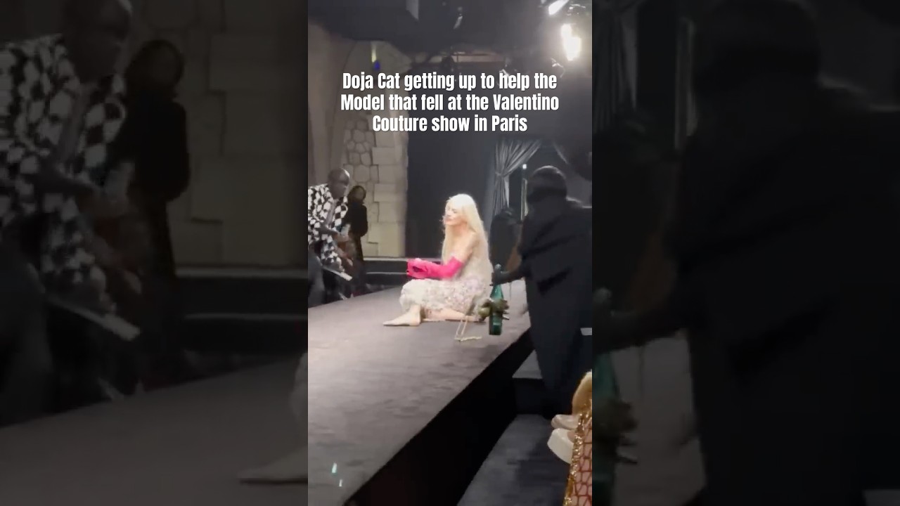 Doja Cat getting up to help the Model that fell at the Valentino Couture show in Paris