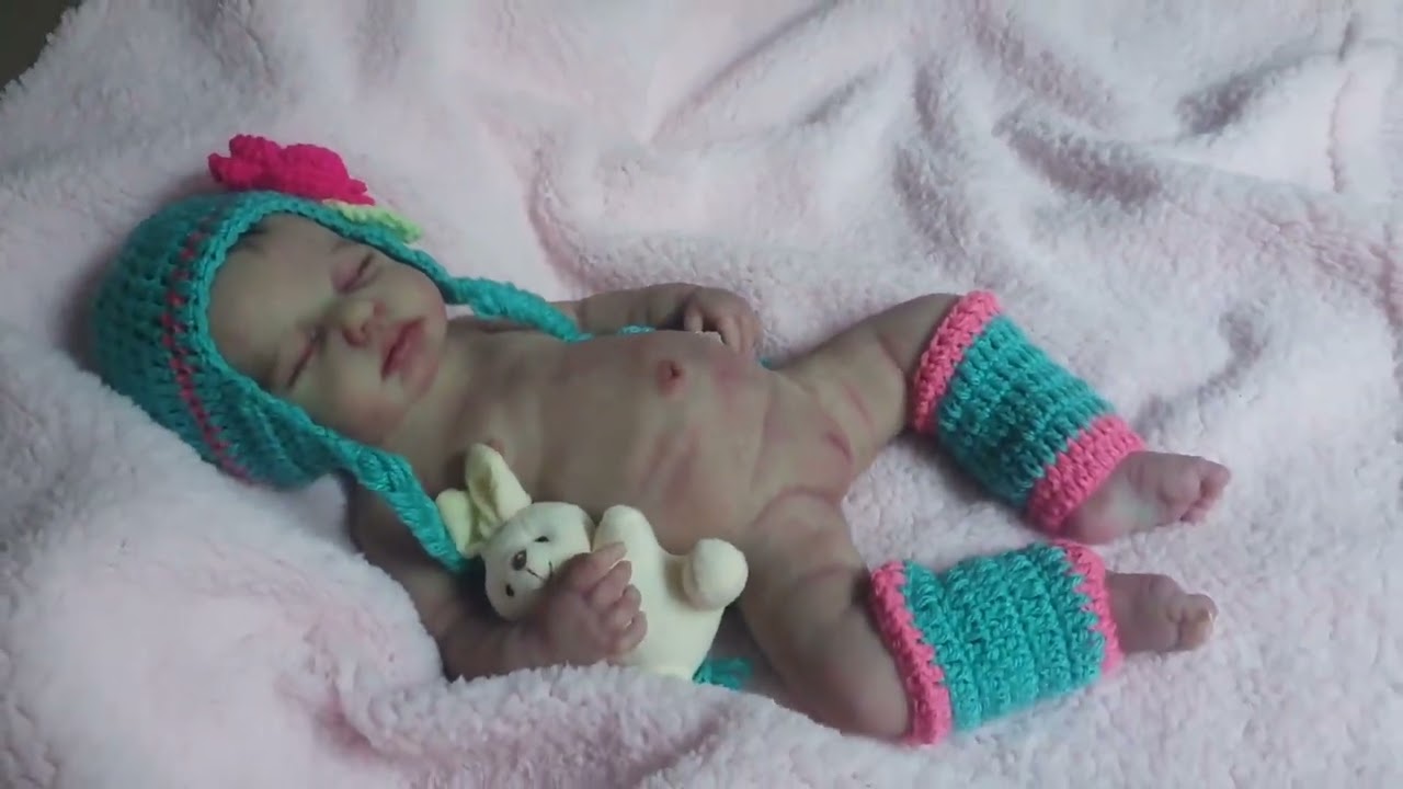 Boneca Beb&ecirc; Reborn de Silicone S&oacute;lido Pode dar Banho Mama e Faz Xixi...