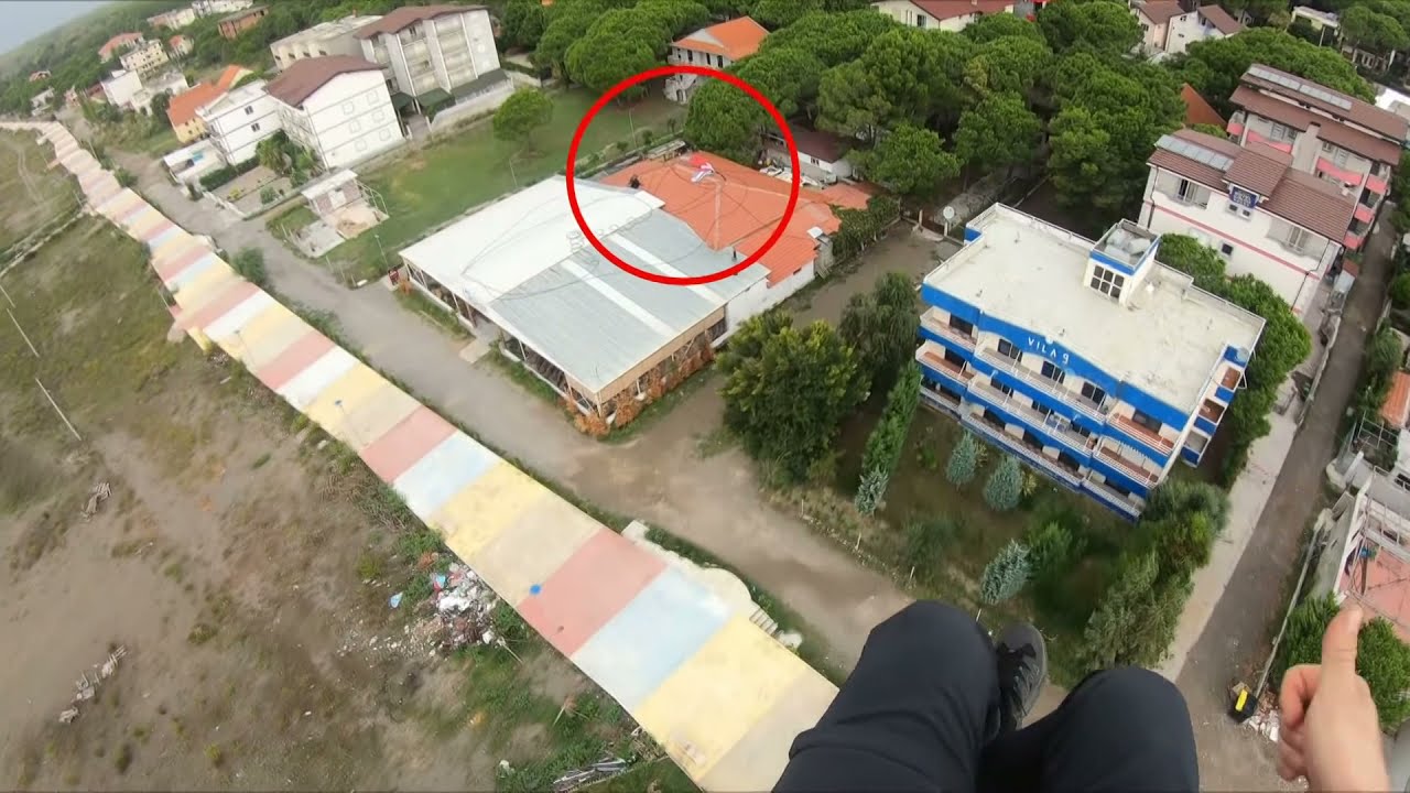 paragliding crash landing on a roof-paramotor accident