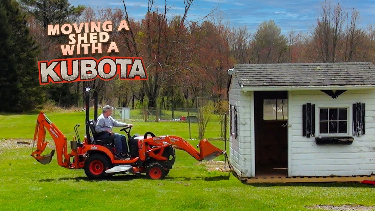 kubota BX23S moving a shed