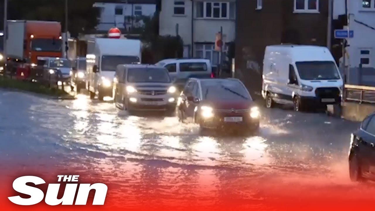 UK weather chaos as floods cause havoc on the roads and tube stations