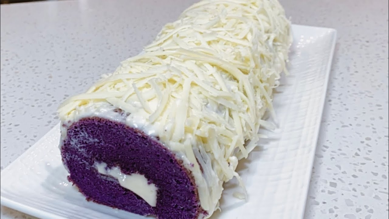 Ube Pianono with cream cheese frosting/ Cheese on top#ube#swissrolls