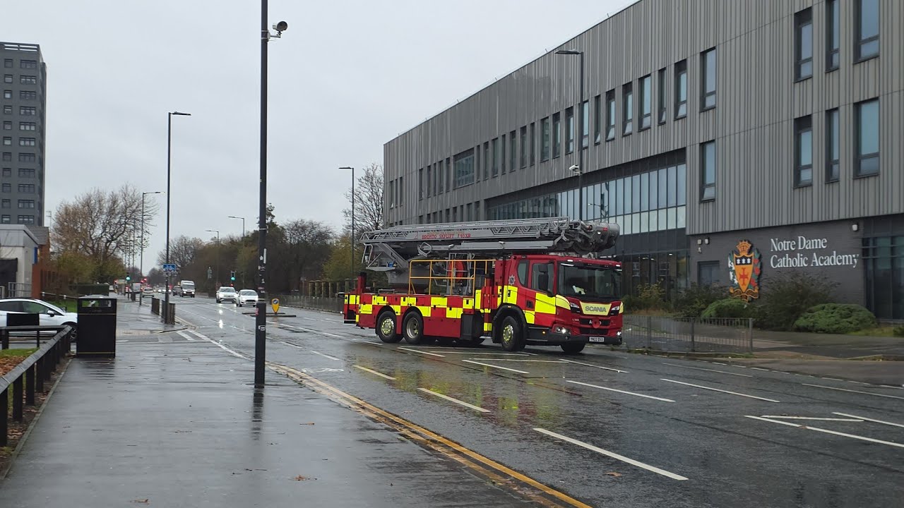 Meet Merseyside Angloco Bronto aerial platform fire truck in a raining day