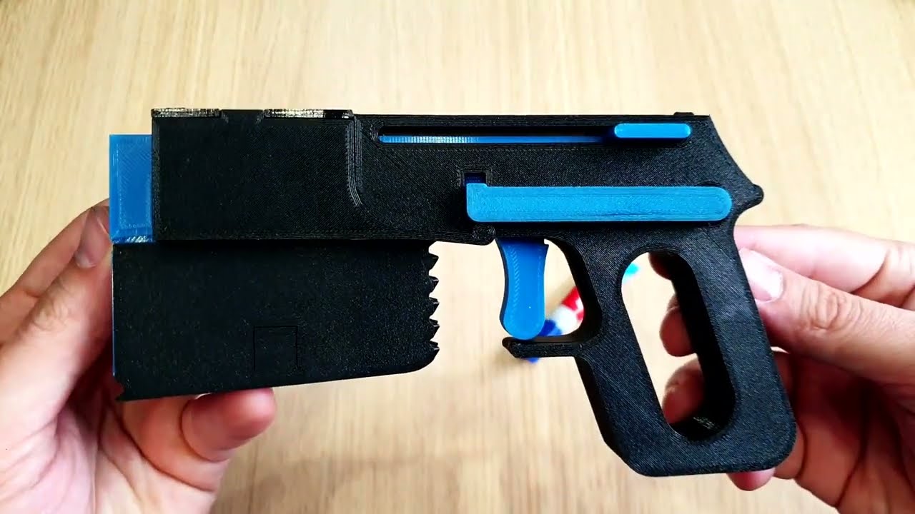 Rubber band launcher for 3D printing