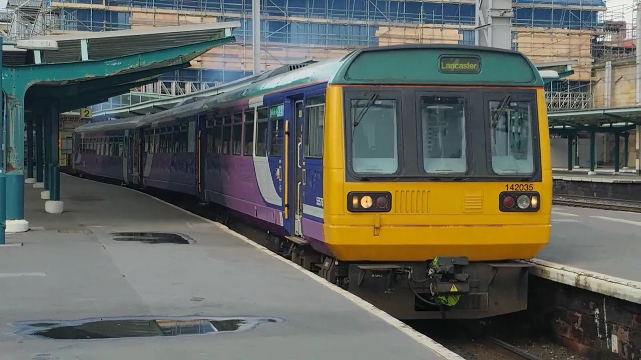 Northern 142035 and 153331 depart from Carlisle