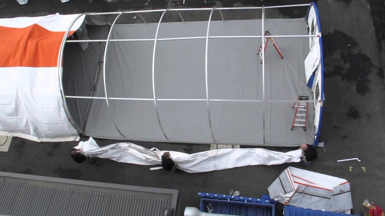 Erection of rapidly deployable portable hospital shelter 2
