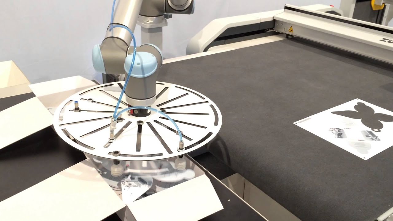 Auto material handling with UR robot (folding carton)
