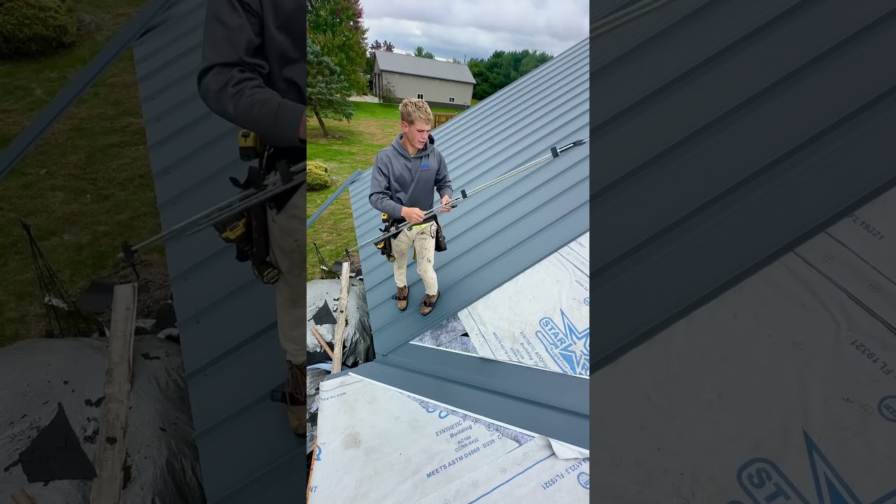 Roofing crew installing Textured Sea Slate Legacy Rib Metal on beautiful home. #Roofing
