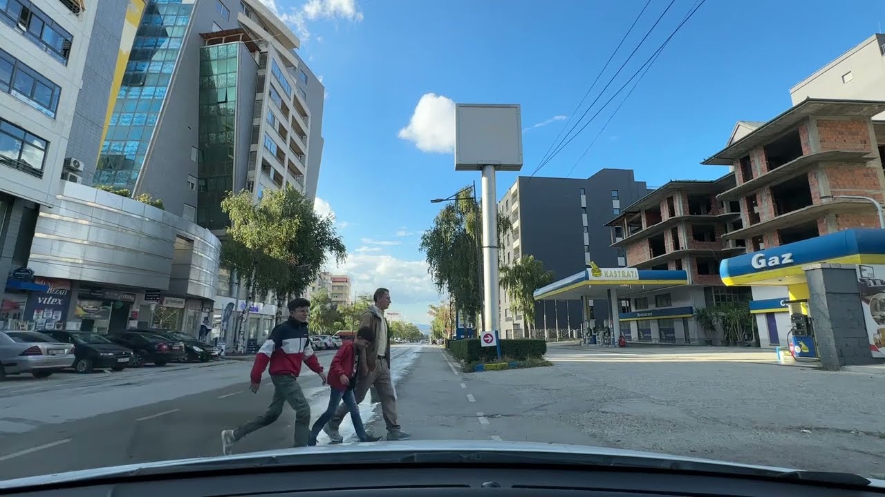 Korca driving cross city
