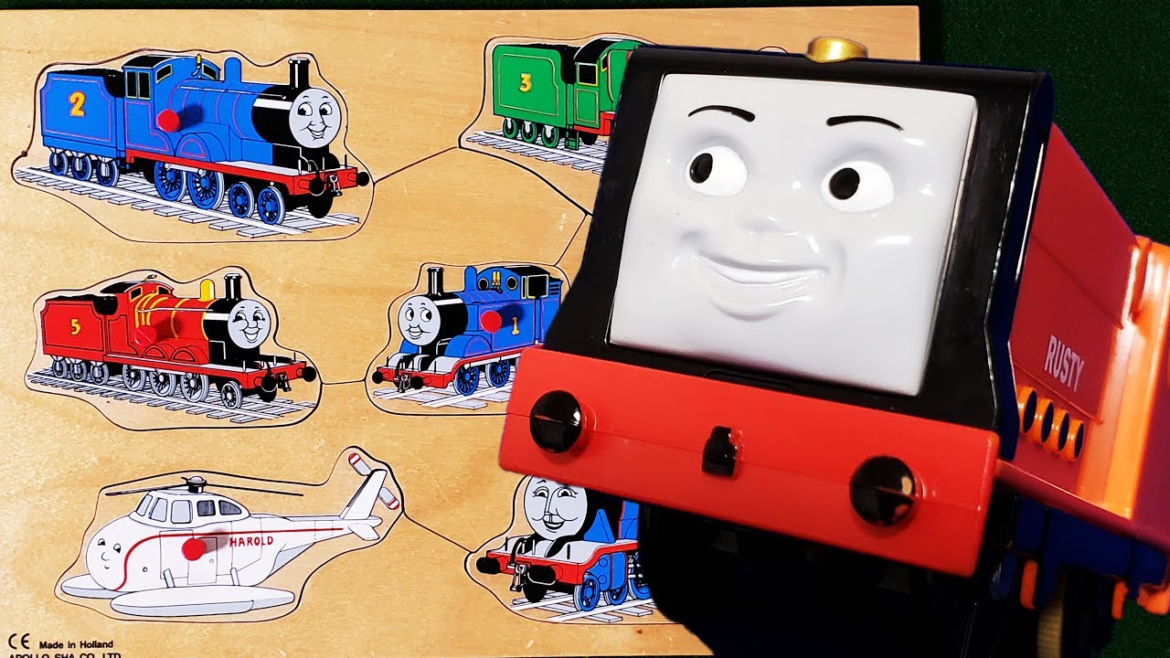 プラレール きかんしゃトーマス ラスティーやレベッカが木製パズルのピースを貨車に乗せて運ぶよ パーシーや金色のヒロがループのコースを上って長い坂を下りていくよ hifumitoy