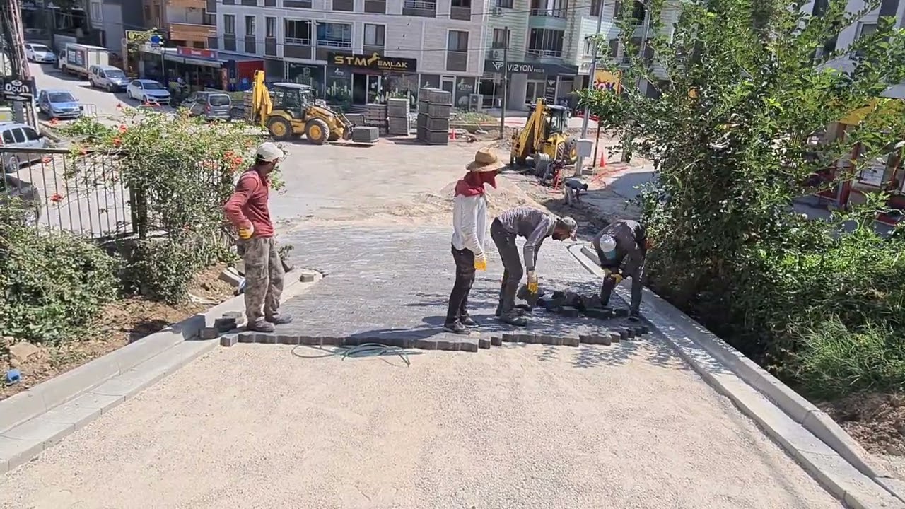 Hidromek 102S helps road workers while laying the paving stones - FULL HD FREE VIDEO #nocopyright
