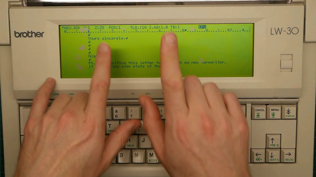 Hjalfi processes words on his new word processor
