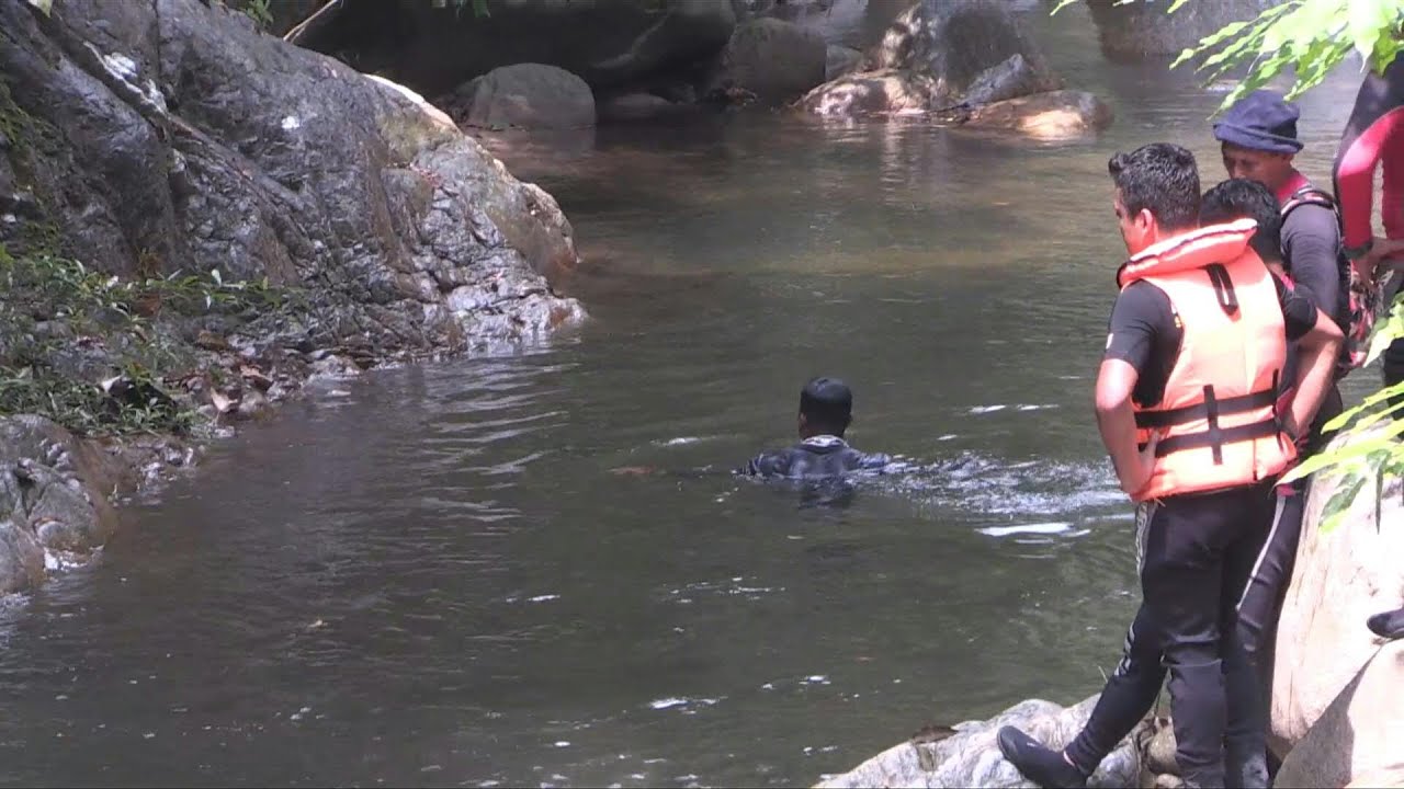 Malaysian divers scour river in hunt for missing Franco-Irish teen | AFP