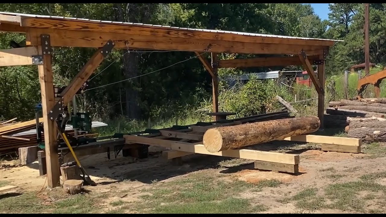 Log Deck With Automatic Raising Ramp