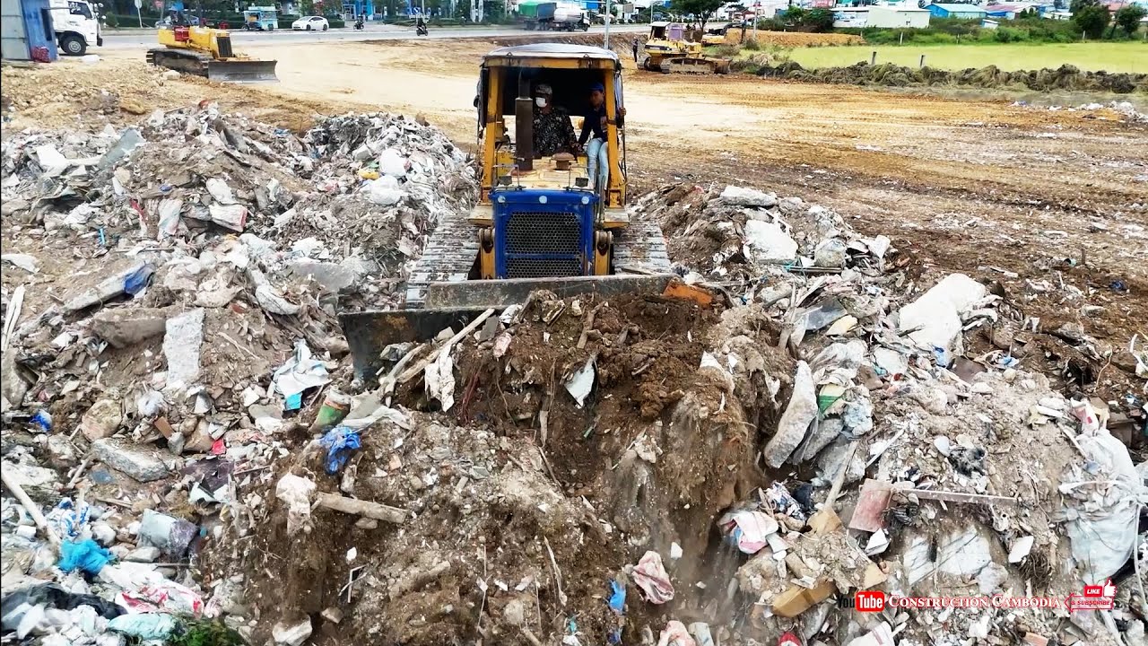 Amazing Teamwork Bulldozer Spreading Soil Dump Trucks Delivering Materials Nonstop