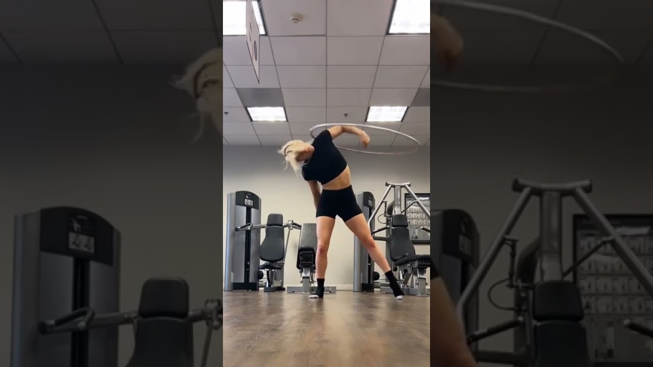 Girl Attempts Insane Hula Hoop Tricks - 1310232