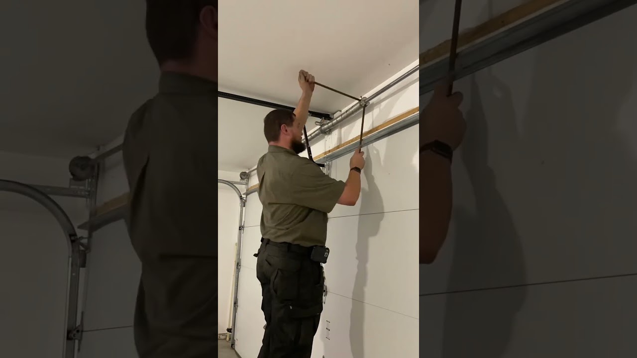 Fixing a garage door that had a broken spring. #HandsomeOrHandy #Handyman  #GarageDoorMaintenance