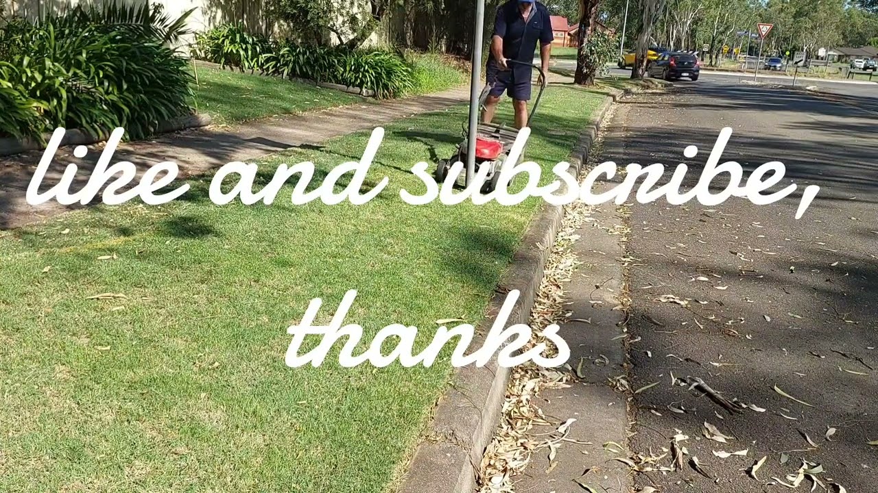 MOWING the overgrown council strip, 1 month later.