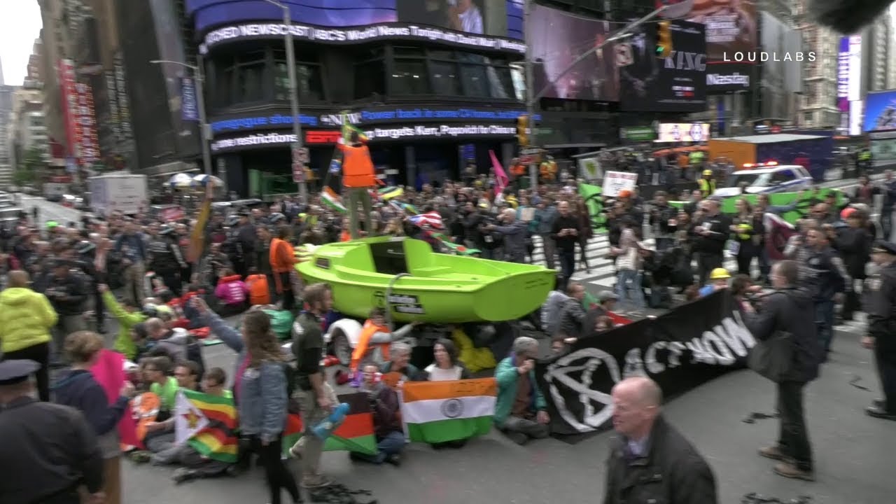 Protestors Put Boat in Times Square, Handcuffs & Glues Themselves to it, 63 Arrests Made