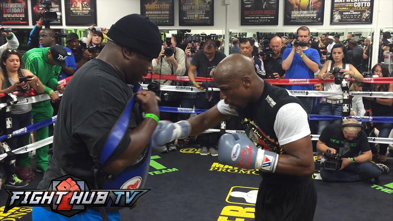 Watch Floyd Mayweather get hands wrapped & hit body shield as he prepares for Manny Pacquiao